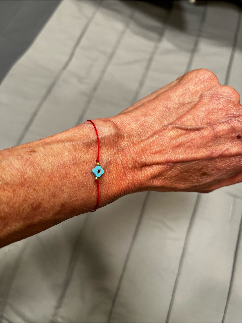 Delicate Red Cord Bracelet with Turquoise Evil Eye Charm